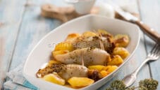 Calamari al forno con patate, che secondo delizioso! Calamari al forno con patate, che secondo delizioso!