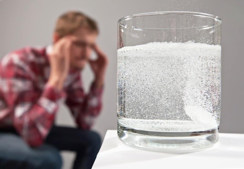 Man Sits On Jar