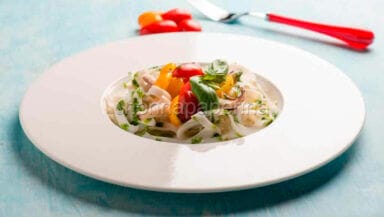 Tagliatelle di seppia con pomodorini rossi e gialli