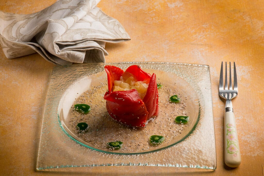 Timballo di peperoni con patate, parmigiano, semi di chia e clorofilla di rucola Timballo di peperoni con patate, parmigiano, semi di chia e clorofilla di rucola