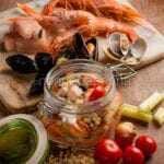 Fregola sarda con zuppetta di pesce in vasocottura