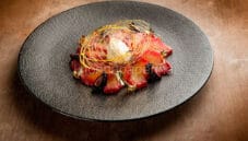 L’ ananas all’anice stellato cotto con purea di lamponi L’ ananas all’anice stellato cotto con purea di lamponi