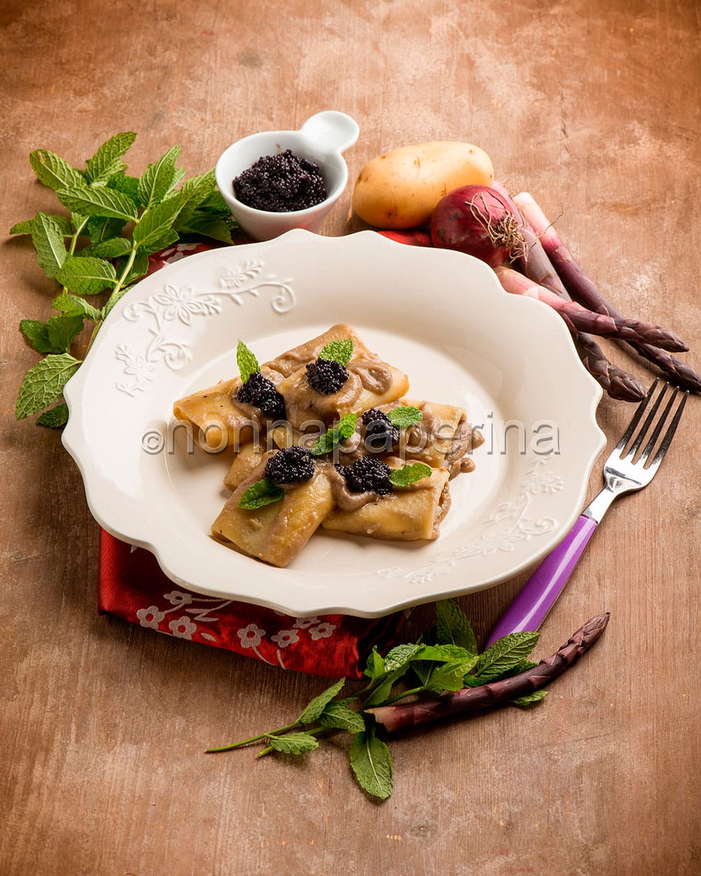 Paccheri con asparagi e caviale