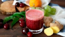 Smoothie alle ciliegie, uva, arancia e zenzero