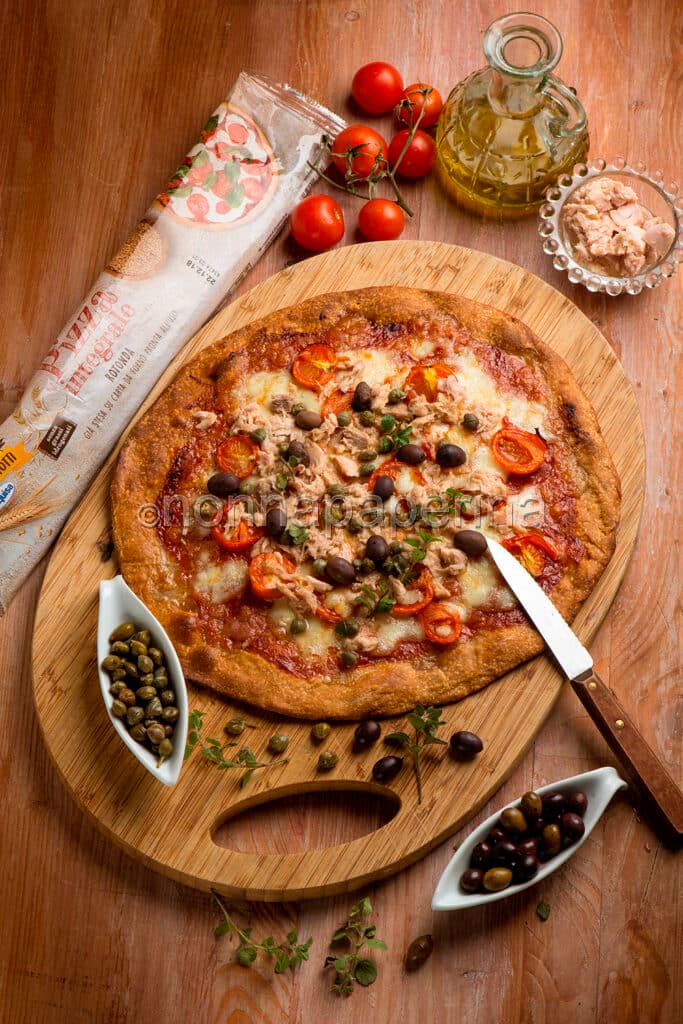 Pizza integrale con pomodorini Pizza integrale con pomodorini