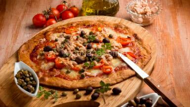 Pizza integrale con pomodorini