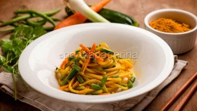 Spaghetti con fagiolini e coriandolo