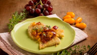 Merluzzo con uva e pomodorini