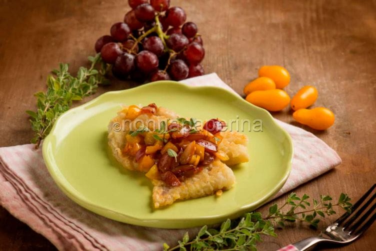 Merluzzo con uva e pomodorini