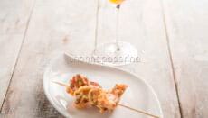 Spiedino di polpo con spritz