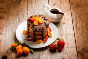 Pancakes al cioccolato e kumquat