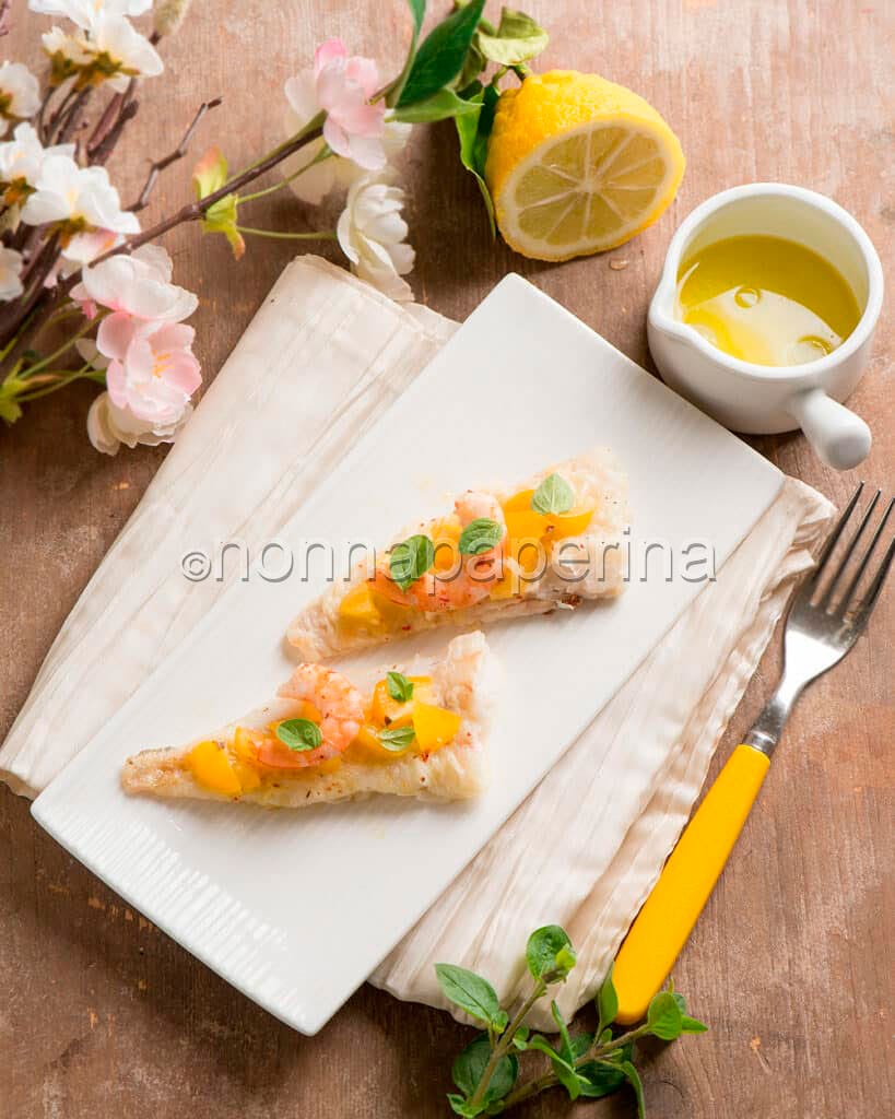 Nasello con mazzancolle e pomodorini