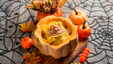 Ravioli di zucca con speck e noci