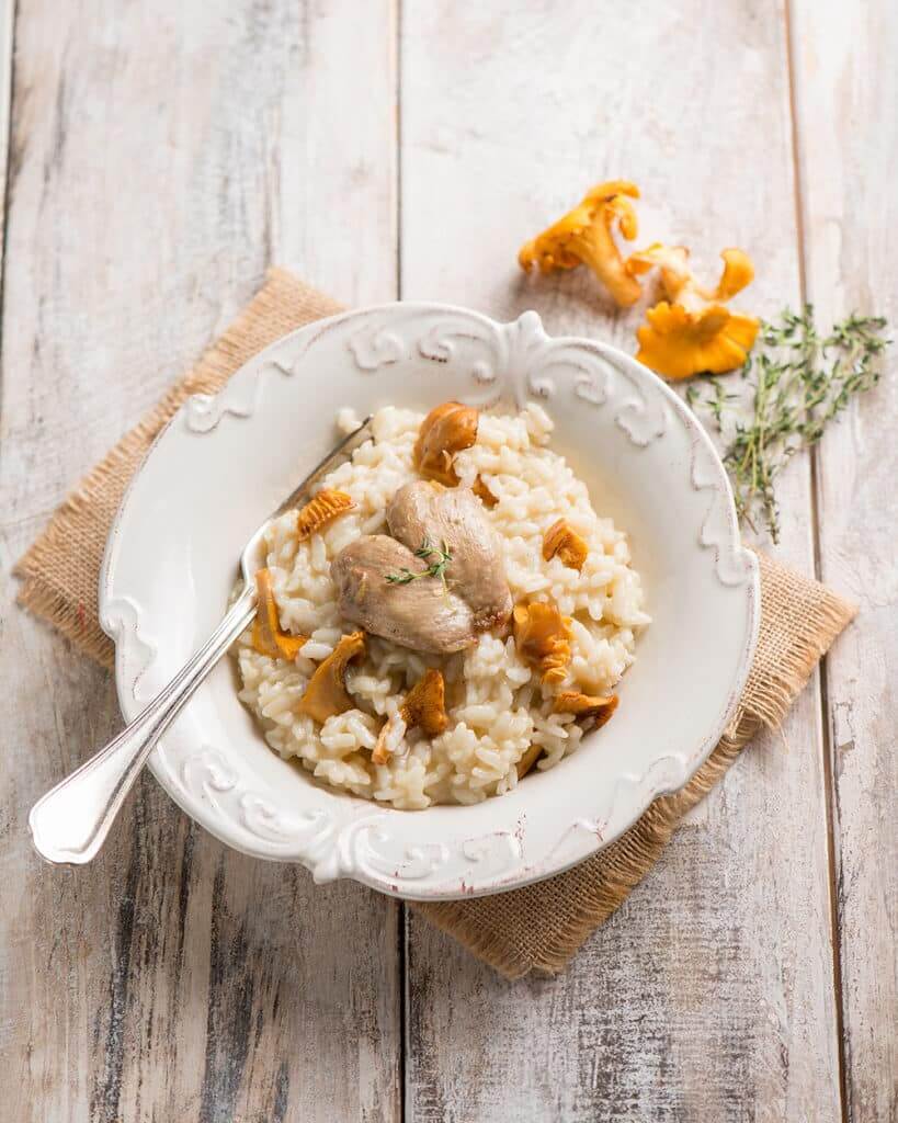 Risotto con petti di quaglia e funghi Risotto con petti di quaglia e funghi