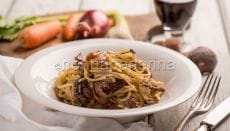 Spaghetti al ragu di fagiano e porcini