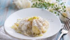 Culurgiones con salsa di bottarga, primo sardo Culurgiones con salsa di bottarga, primo sardo