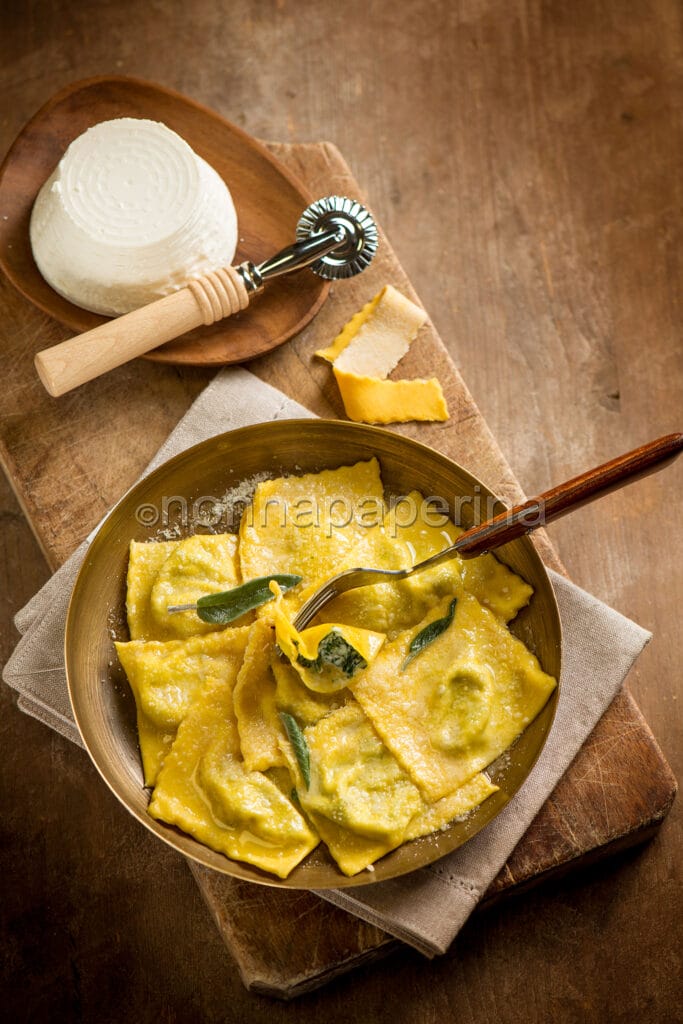 Tortelli di erbette alla parmigiana Tortelli di erbette alla parmigiana