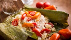 Storione con couscous in foglia di banano