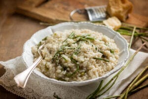 Asparagus fern risotto, a delicate and aromatic first course Asparagus fern risotto, a delicate and aromatic first course