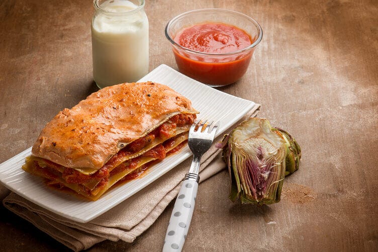 Lasagne di lenticchie ai carciofi: una ricetta golosa e genuina senza rinunce Lasagne di lenticchie ai carciofi: per una domenica golosa e genuina senza rinunce