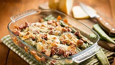 Taccole al forno con prosciutto cotto, un gratin rustico