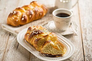 Braided sweet bread with raisins and candied fruit, an Easter dessert Braided sweet bread with raisins and candied fruit, an Easter dessert