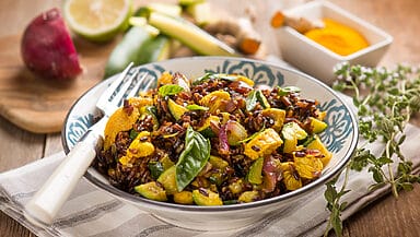 Riso con pollo e zucchine