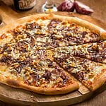 Pizza with onions, walnuts, and gorgonzola cheese, an excellent white pizza Pizza with onions, walnuts, and gorgonzola cheese, an excellent white pizza