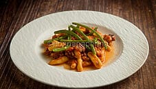 Caserecce al ragù di polpo e fagiolini: un primo rustico Caserecce al ragù di polpo e fagiolini: un primo rustico