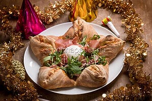 Pizza a stella: una ricetta creativa e squisita per Natale Pizza a stella: una ricetta creativa e squisita per Natale