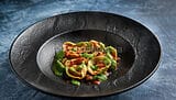 Tortelli di branzino e cozze: una pasta ripiena gourmet Tortelli di branzino e cozze: una pasta ripiena gourmet