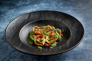 Tortelli di branzino e cozze: una pasta ripiena gourmet Tortelli di branzino e cozze: una pasta ripiena gourmet
