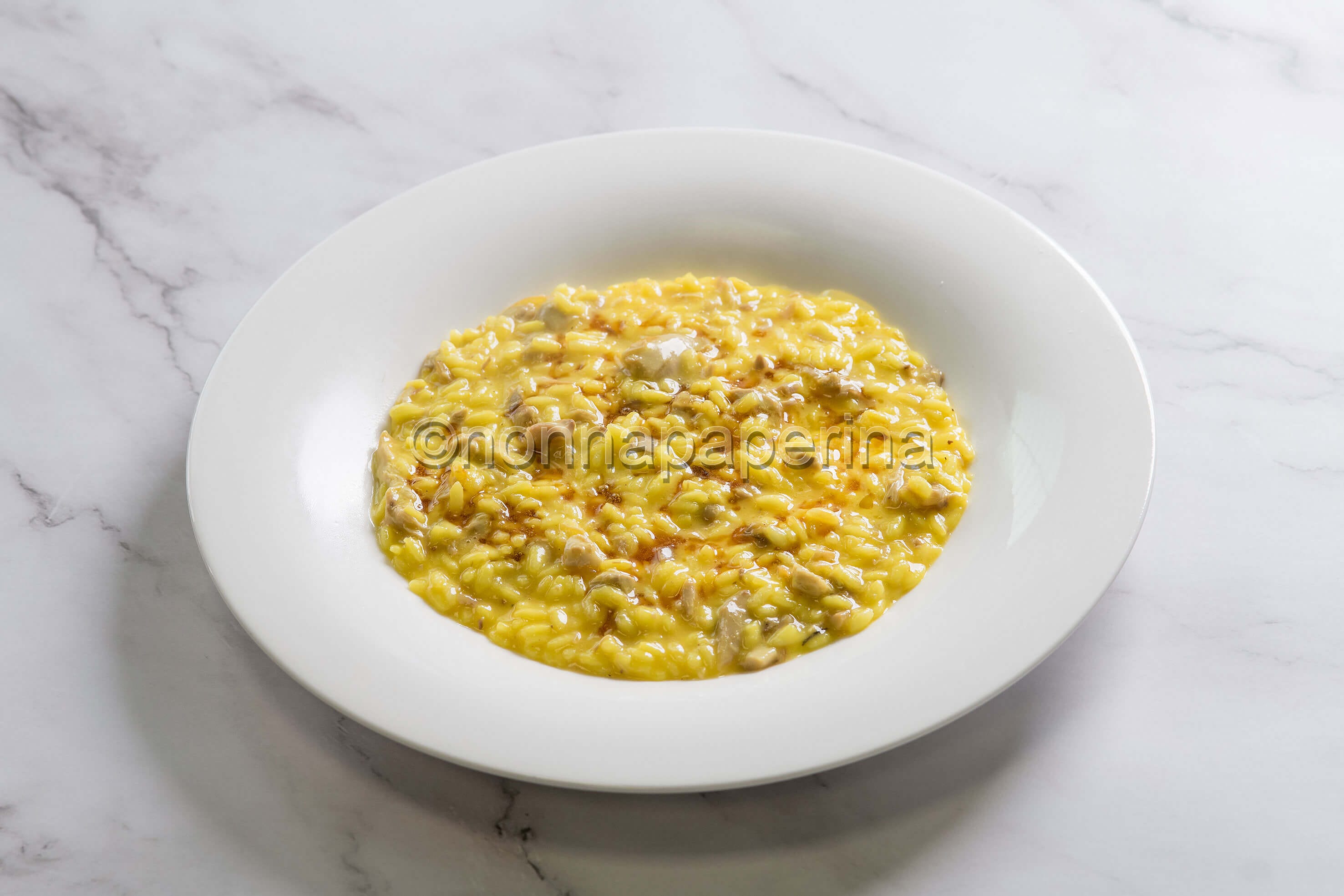 Risotto con quaglie e zafferano, un’ottima ricetta rustica