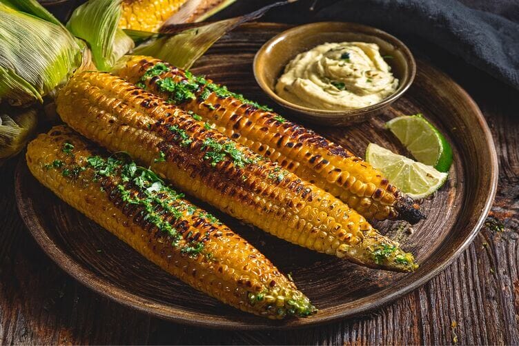 Pannocchie alla griglia con burro alle erbe Pannocchie alla griglia con burro alle erbe