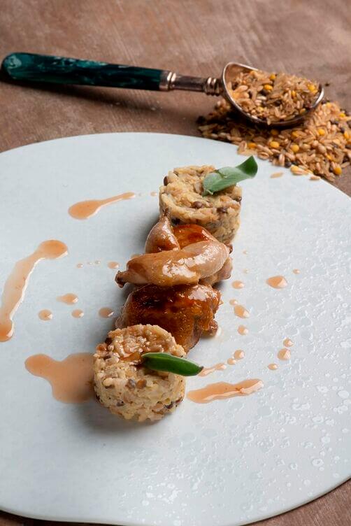Quaglie glassate al miele e riso