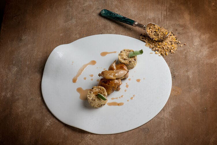 Quaglie glassate al miele e riso