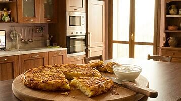 Rosti con taleggio e speck